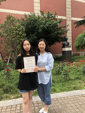 特等奖龚熹和黄建清老师合影